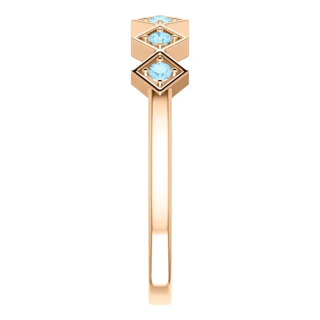 14KT GOLD 0.12 CTW ROUND AQUAMARINE STACKABLE RING